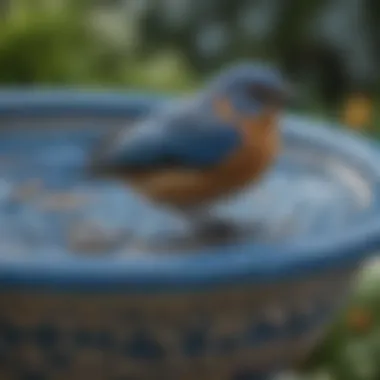 Close-up of the intricate design features of a blue bird bath